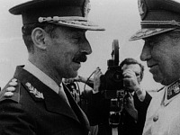 Argentine dictator Jorge Rafael Videla greets fellow South American strongman Augusto Pinochet